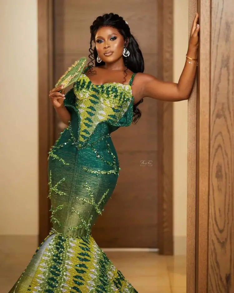 WEDDING PICTURES OF BERLA MUNDI AND HUSBAND DAVID TABI