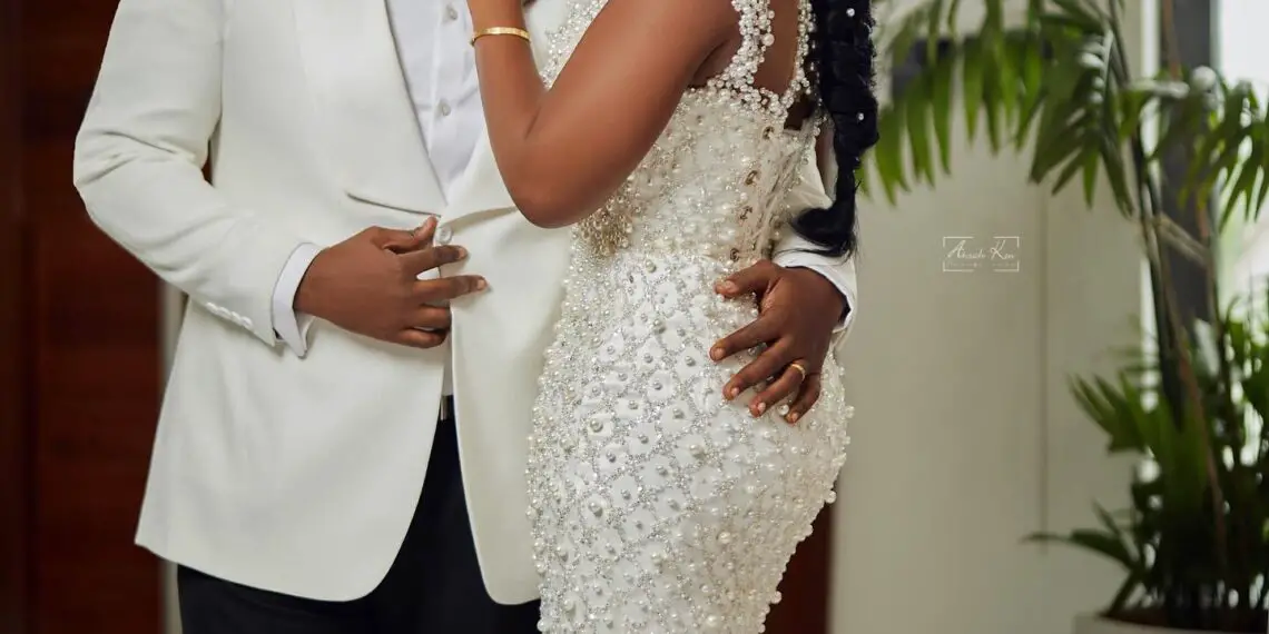 WEDDING PICTURES OF BERLA MUNDI AND HUSBAND DAVID TABI