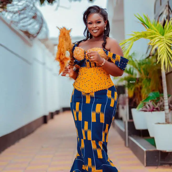 Blue Kente Styles Outfit worn by a Ghanaian bride