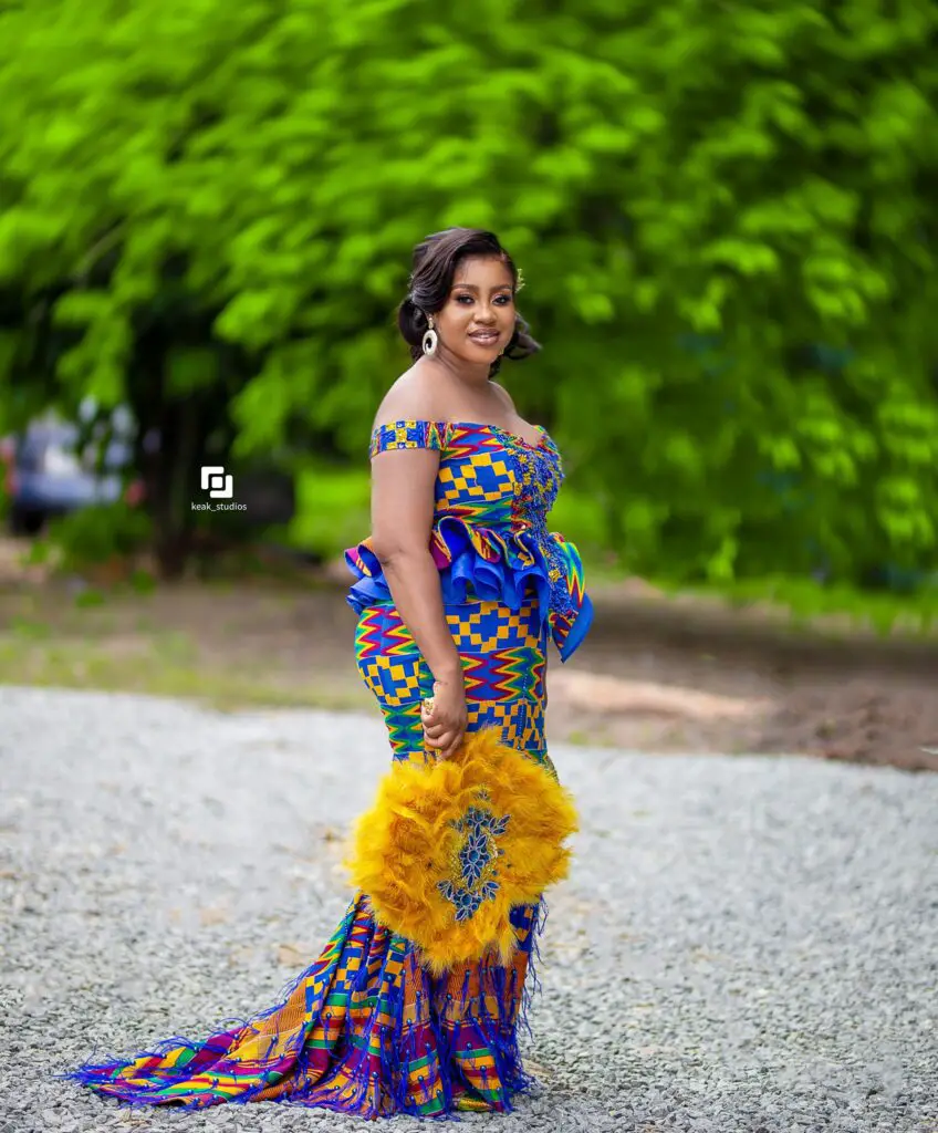 Blue Kente Styles Outfit worn by a Ghanaian bride