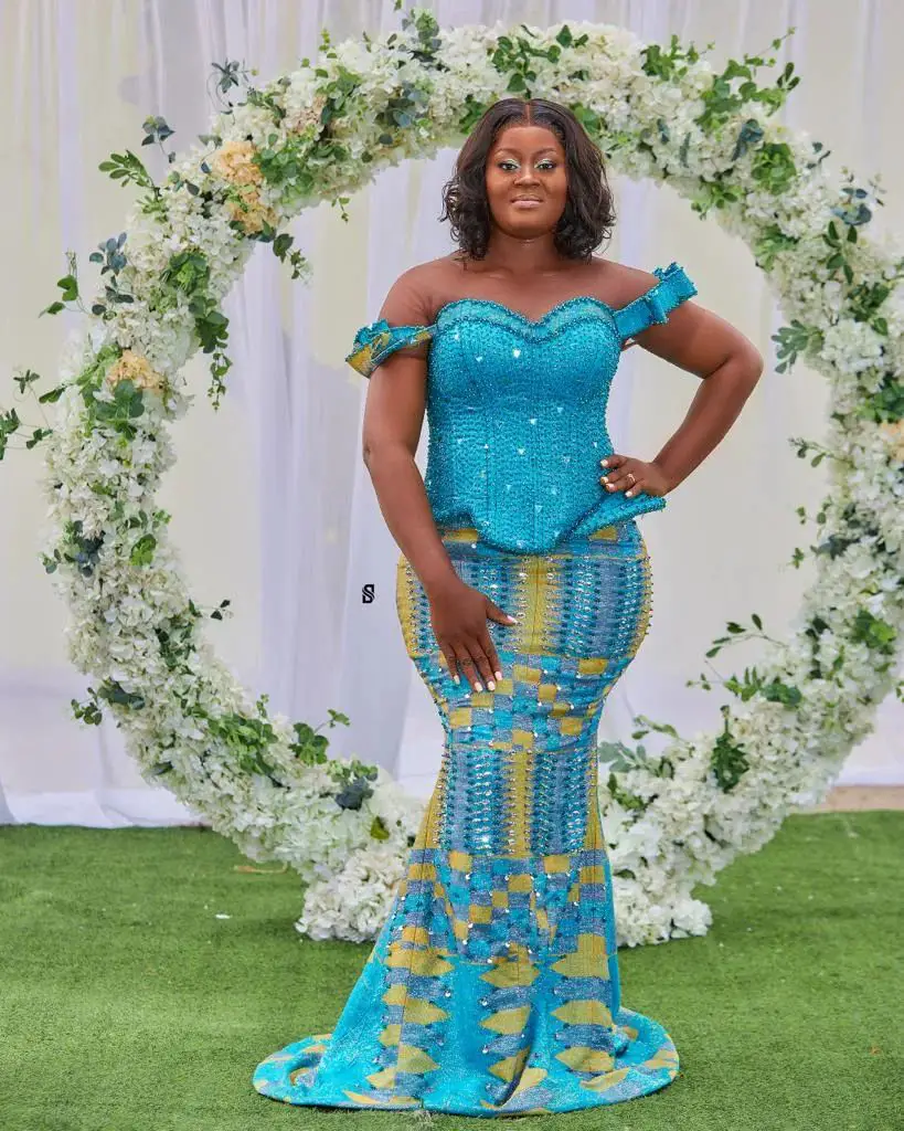 Light Blue Kente Styles Outfit worn by a Ghanaian bride