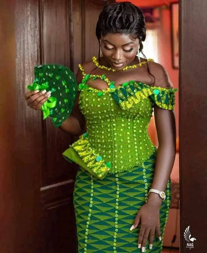 A Ghanaian bride in her green kente dress