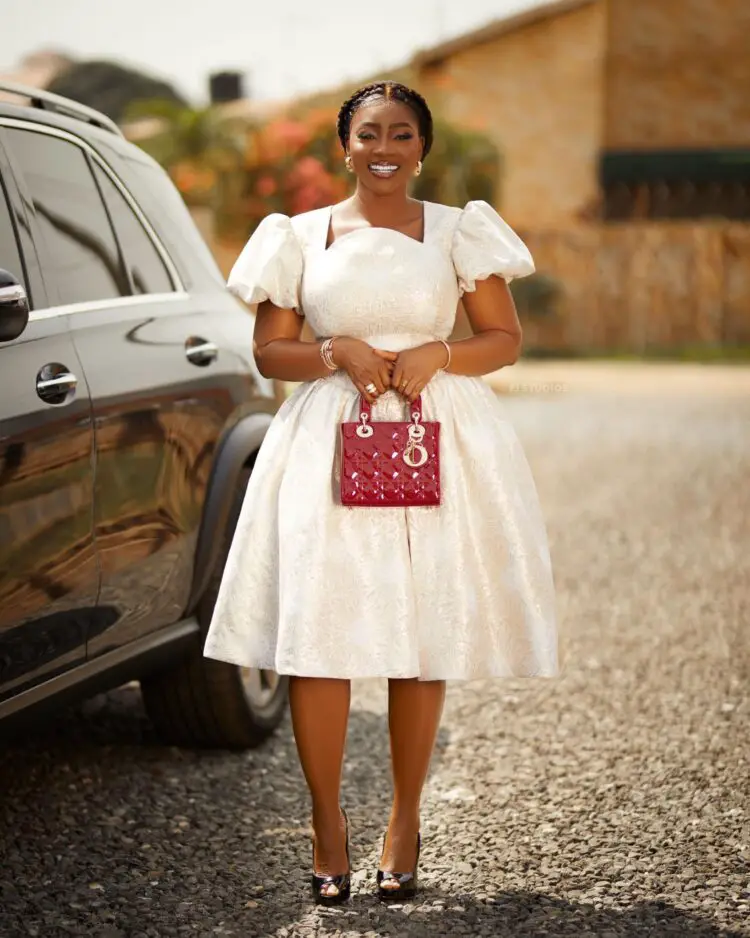 Cookie Tee in an elegant dress for wedding guest