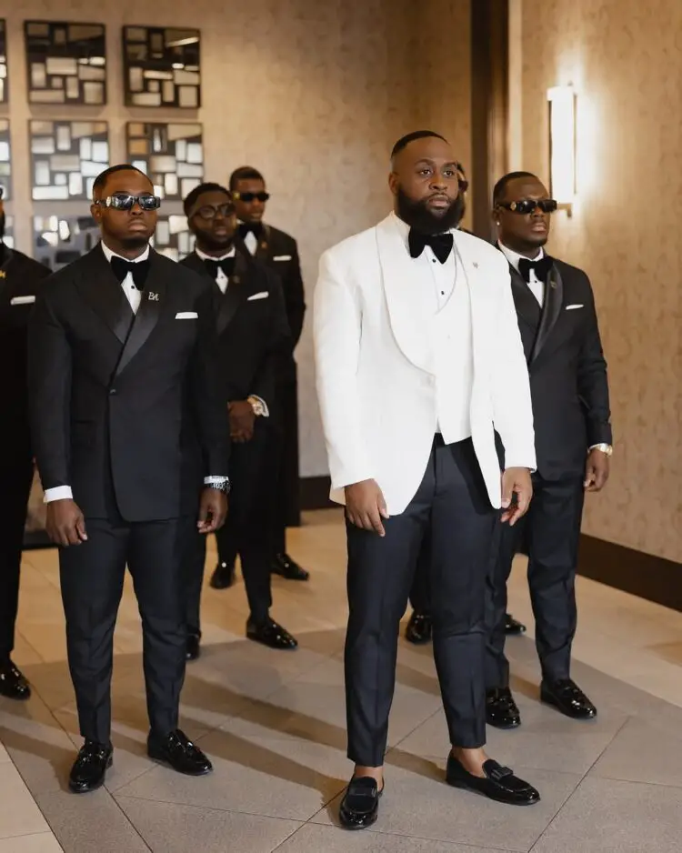 STANDING GROOM AND GROOMSMEN