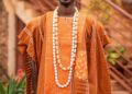 GROOM IN ORANGE KAFTAN