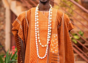 GROOM IN ORANGE KAFTAN