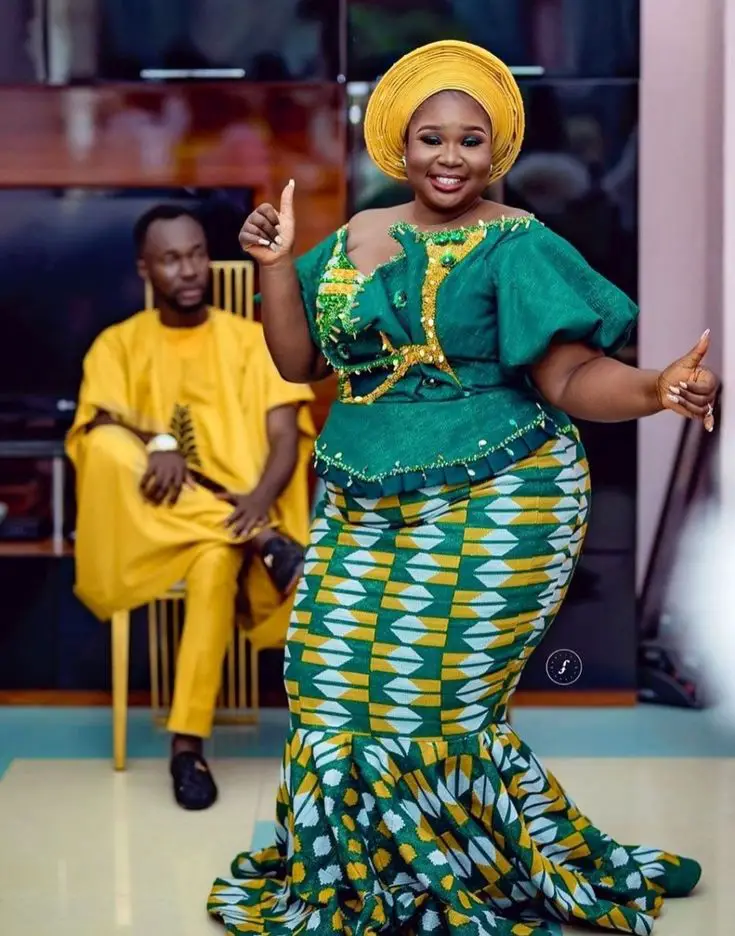 BRIDE IN GREEN KENTE