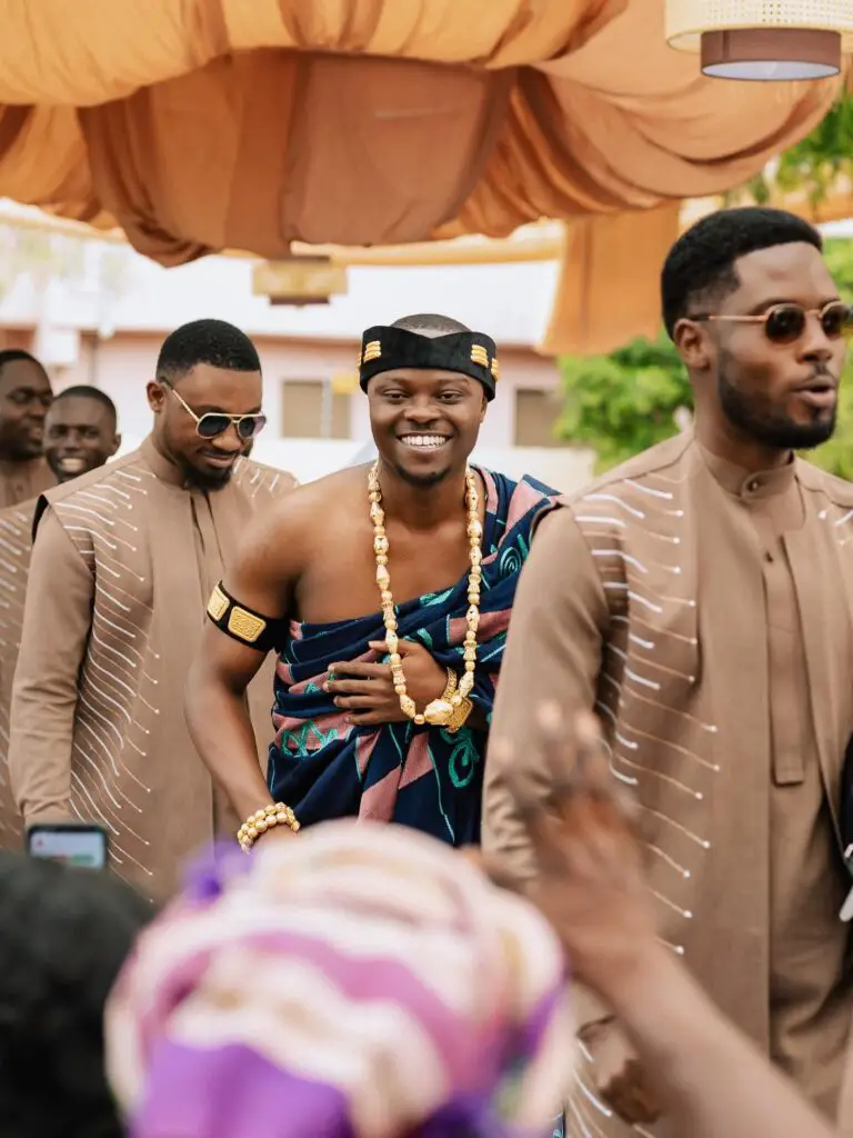 GROOM IN KENTE DRAPE