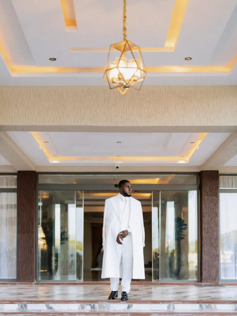 GHANAIAN GROOM IN WHITE SUIT
