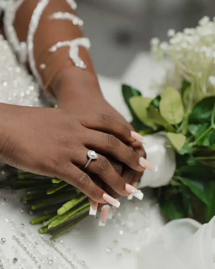 BRIDE HOLDING BOUQUET