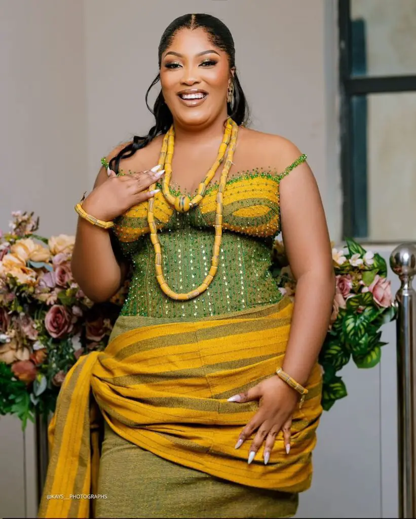 A PLUS SIZE GHANAIAN BRIDE IN SMOCK OUTFIT