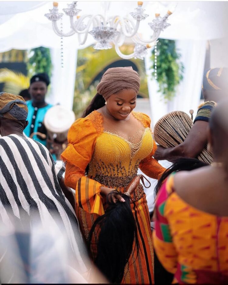 WOMAN DANCING AT A WEDDING IN SMOCK CLOTH