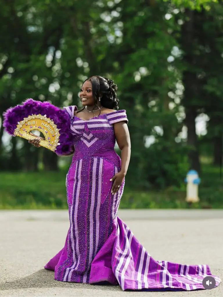 A BRIDE IN PURPLE SMOCK CLOTH